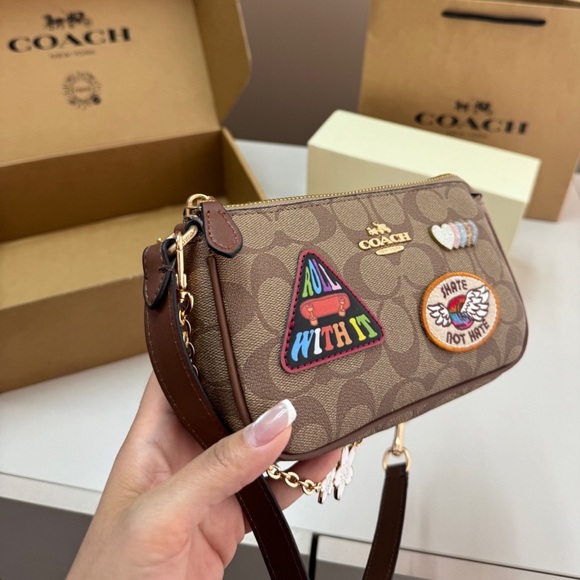 Coach Handbags - Coach Nolita 19 Bag with Pride
Patches, 2-Way Carry